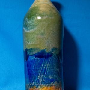 GREEN BLUE AND TAN BOTTLE dimensions 7.5"x 2.5"x 2.5" $49